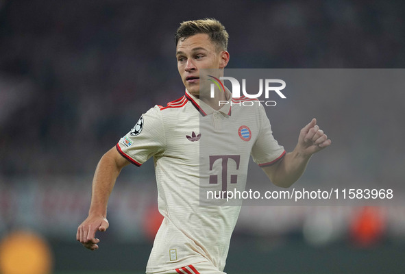 Joshua Kimmich of Bayern Munich  looks on  during the Champions League Round 1 match between Bayern Munich v Dinamo Zagreb, at the Allianz A...