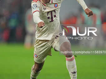 Jamal Musiala of Bayern Munich  controls the ball  during the Champions League Round 1 match between Bayern Munich v Dinamo Zagreb, at the A...