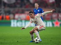 Jamal Musiala of Bayern Munich  controls the ball  during the Champions League Round 1 match between Bayern Munich v Dinamo Zagreb, at the A...