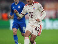 Jamal Musiala of Bayern Munich  controls the ball  during the Champions League Round 1 match between Bayern Munich v Dinamo Zagreb, at the A...