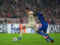 Jamal Musiala of Bayern Munich  controls the ball  during the Champions League Round 1 match between Bayern Munich v Dinamo Zagreb, at the A...