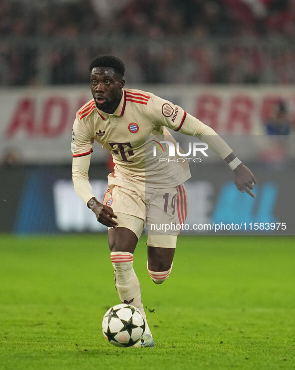 Alphonso Davies of Bayern Munich  controls the ball  during the Champions League Round 1 match between Bayern Munich v Dinamo Zagreb, at the...