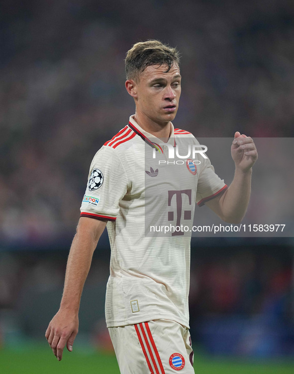 Joshua Kimmich of Bayern Munich  looks on  during the Champions League Round 1 match between Bayern Munich v Dinamo Zagreb, at the Allianz A...