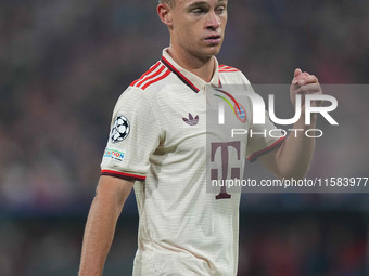 Joshua Kimmich of Bayern Munich  looks on  during the Champions League Round 1 match between Bayern Munich v Dinamo Zagreb, at the Allianz A...