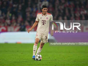 Minjae Kim of Bayern Munich  controls the ball  during the Champions League Round 1 match between Bayern Munich v Dinamo Zagreb, at the Alli...