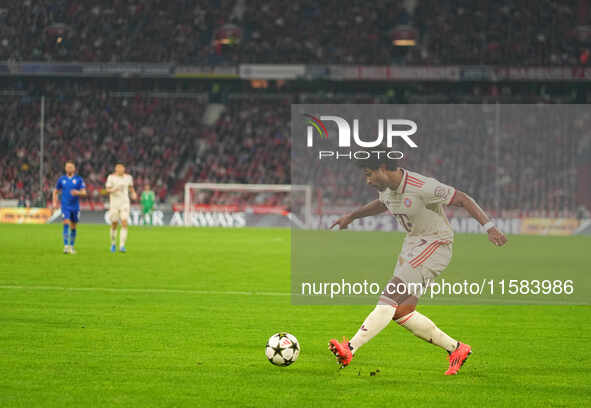 Serge Gnabry of Bayern Munich  controls the ball  during the Champions League Round 1 match between Bayern Munich v Dinamo Zagreb, at the Al...