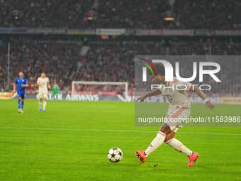 Serge Gnabry of Bayern Munich  controls the ball  during the Champions League Round 1 match between Bayern Munich v Dinamo Zagreb, at the Al...