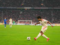 Serge Gnabry of Bayern Munich  controls the ball  during the Champions League Round 1 match between Bayern Munich v Dinamo Zagreb, at the Al...