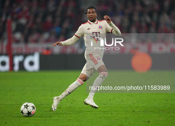 Michael Olise of Bayern Munich  controls the ball  during the Champions League Round 1 match between Bayern Munich v Dinamo Zagreb, at the A...