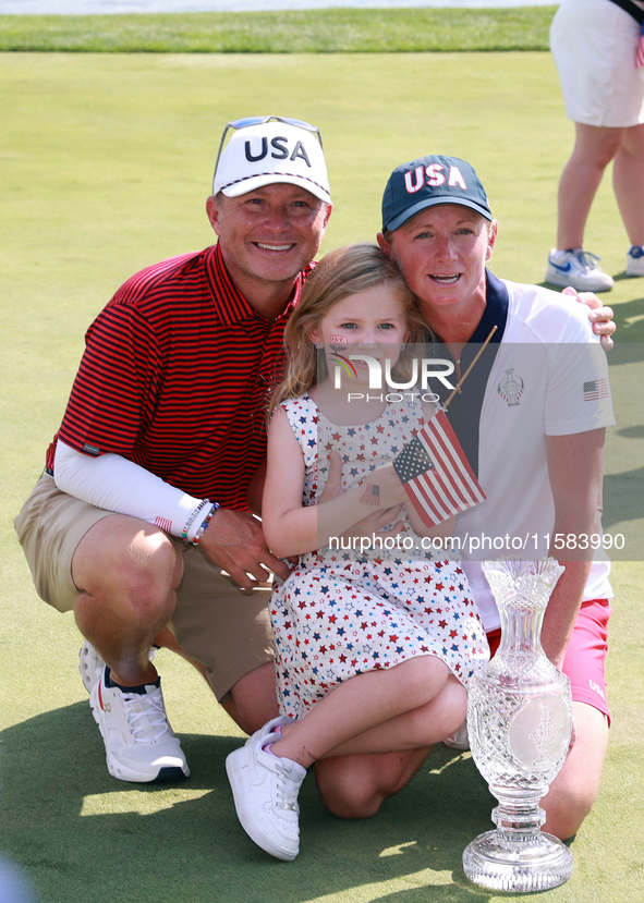 GAINESVILLE, VIRGINIA - SEPTEMBER 15: Captain Stacy Lewis of the United States poses with her husband Gerrod Chadwell and their daughter Che...