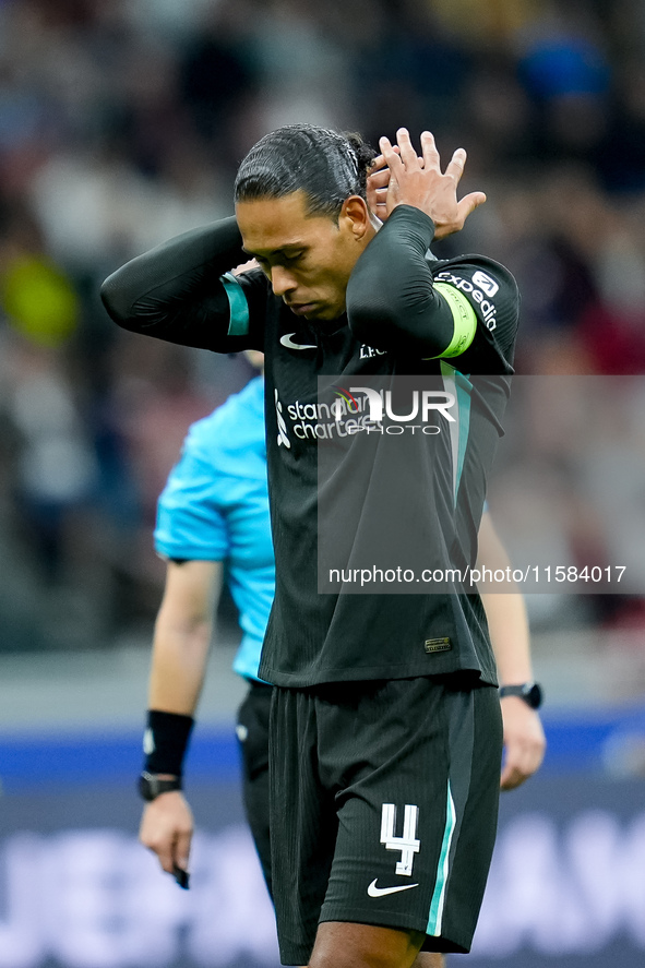 Virgil van Dijk of Liverpool FC reacts during the UEFA Champions League 2024/25 League Phase MD1 match between AC Milan and Liverpool FC at...