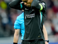 Virgil van Dijk of Liverpool FC reacts during the UEFA Champions League 2024/25 League Phase MD1 match between AC Milan and Liverpool FC at...