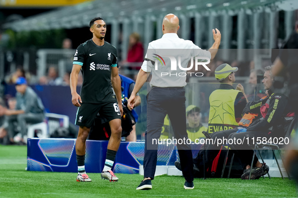 Trent Alexander-Arnold of Liverpool FC and Arne Slot head coach of Liverpool FC during the UEFA Champions League 2024/25 League Phase MD1 ma...