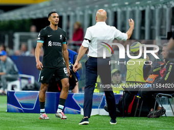 Trent Alexander-Arnold of Liverpool FC and Arne Slot head coach of Liverpool FC during the UEFA Champions League 2024/25 League Phase MD1 ma...