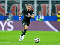 Kostas Tsimikas of Liverpool FC during the UEFA Champions League 2024/25 League Phase MD1 match between AC Milan and Liverpool FC at Stadio...