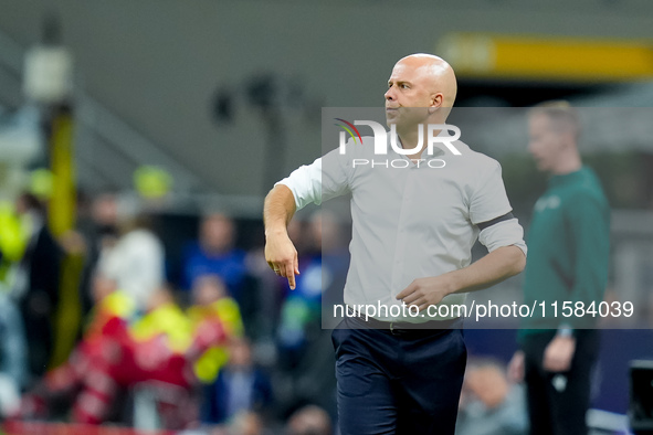 Arne Slot head coach of Liverpool FC gestures during the UEFA Champions League 2024/25 League Phase MD1 match between AC Milan and Liverpool...