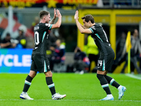 Alexis Mac Allister of Liverpool FC and Federico Chiesa of Liverpool FC during the UEFA Champions League 2024/25 League Phase MD1 match betw...