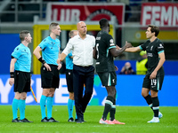 Arne Slot head coach of Liverpool FC greets Federico Chiesa of Liverpool FC during the UEFA Champions League 2024/25 League Phase MD1 match...