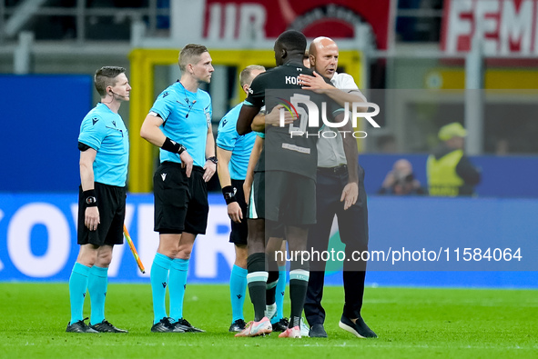 Arne Slot head coach of Liverpool FC and Ibrahima Konate' of Liverpool FC during the UEFA Champions League 2024/25 League Phase MD1 match be...