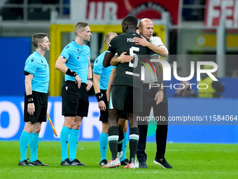 Arne Slot head coach of Liverpool FC and Ibrahima Konate' of Liverpool FC during the UEFA Champions League 2024/25 League Phase MD1 match be...