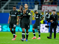 Virgil van Dijk of Liverpool FC applauds during the UEFA Champions League 2024/25 League Phase MD1 match between AC Milan and Liverpool FC a...