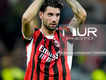 Dominik Szoboszlai of Liverpool FC applauds during the UEFA Champions League 2024/25 League Phase MD1 match between AC Milan and Liverpool F...