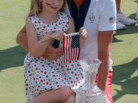 GAINESVILLE, VIRGINIA - SEPTEMBER 15: Captain Stacy Lewis of the United States poses with her daughter Chesnee at the conclusion of the Solh...