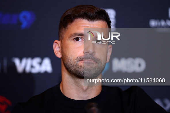 Bulgaria's Grigor Dimitrov and Serbia's Novak Djokovic speak to the media at a press conference before their tennis gala match at Arena Sofi...