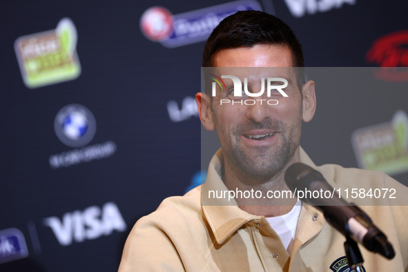 Bulgaria's Grigor Dimitrov and Serbia's Novak Djokovic speak to the media at a press conference before their tennis gala match at Arena Sofi...