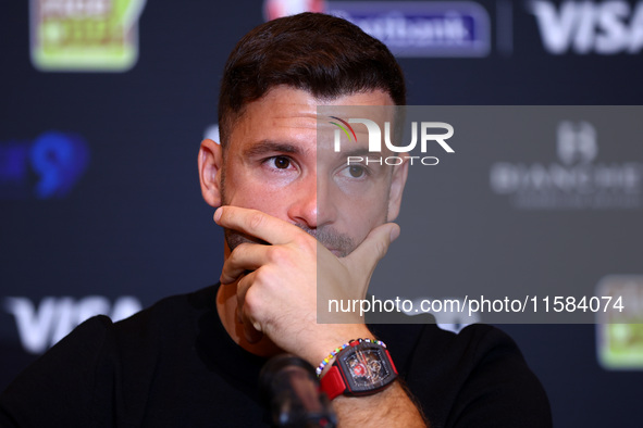 Bulgaria's Grigor Dimitrov and Serbia's Novak Djokovic speak to the media at a press conference before their tennis gala match at Arena Sofi...