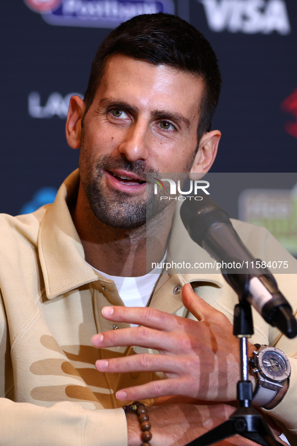 Bulgaria's Grigor Dimitrov and Serbia's Novak Djokovic speak to the media at a press conference before their tennis gala match at Arena Sofi...