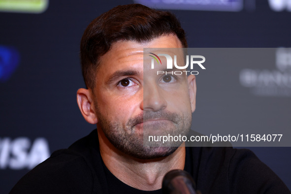 Bulgaria's Grigor Dimitrov and Serbia's Novak Djokovic speak to the media at a press conference before their tennis gala match at Arena Sofi...