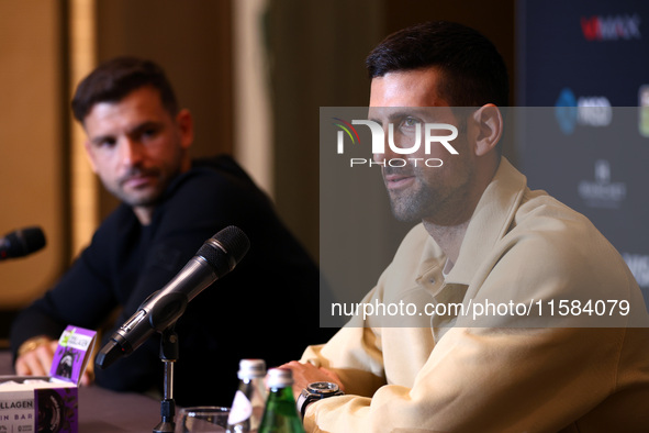 Bulgaria's Grigor Dimitrov and Serbia's Novak Djokovic speak to the media at a press conference before their tennis gala match at Arena Sofi...