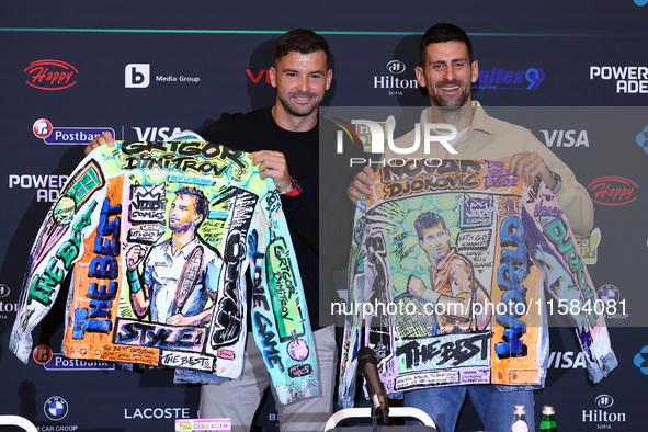 Bulgaria's Grigor Dimitrov and Serbia's Novak Djokovic speak to the media at a press conference before their tennis gala match at Arena Sofi...