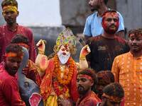 Devotees take the idol of Lord Vishwokarma to immerse it in a river on the outskirts of Kathmandu, Nepal, on September 18, 2024. Vishwokarma...