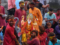 Devotees take the idol of Lord Vishwokarma to immerse it in a river on the outskirts of Kathmandu, Nepal, on September 18, 2024. Vishwokarma...