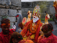 Devotees take the idol of Lord Vishwokarma to immerse it in a river on the outskirts of Kathmandu, Nepal, on September 18, 2024. Vishwokarma...