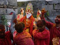 Devotees take the idol of Lord Vishwokarma to immerse it in a river on the outskirts of Kathmandu, Nepal, on September 18, 2024. Vishwokarma...