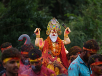 Devotees take the idol of Lord Vishwokarma to immerse it in a river on the outskirts of Kathmandu, Nepal, on September 18, 2024. Vishwokarma...