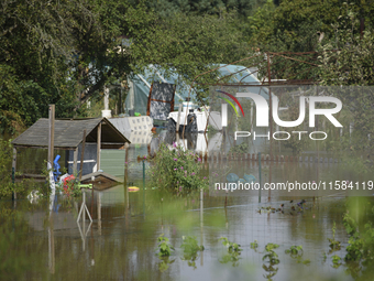 Social gardens are submerged in floodwaters in Wroclaw, Poland, on September 18, 2024. The government outlines a reconstruction plan once th...