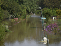 Social gardens are submerged in floodwaters in Wroclaw, Poland, on September 18, 2024. The government outlines a reconstruction plan once th...