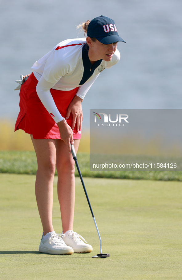 GAINESVILLE, VIRGINIA - SEPTEMBER 15: Sarah Schmelzel of the United States lines up her putt on the 18th green at the conclusion of the Solh...