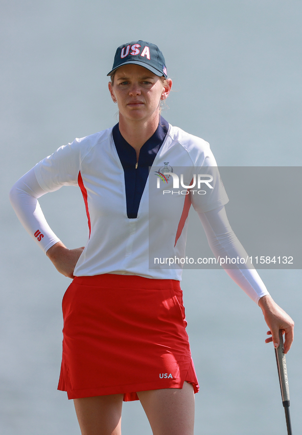 GAINESVILLE, VIRGINIA - SEPTEMBER 15: Sarah Schmelzel of the United States waits on the 18th green at the conclusion of the Solheim Cup at R...