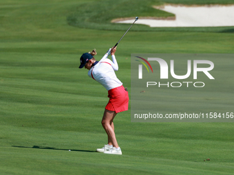 GAINESVILLE, VIRGINIA - SEPTEMBER 15: Sarah Schmelzel of the United States hits to the 18th green at the conclusion of the Solheim Cup at Ro...