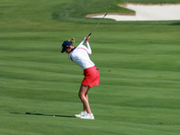 GAINESVILLE, VIRGINIA - SEPTEMBER 15: Sarah Schmelzel of the United States hits to the 18th green at the conclusion of the Solheim Cup at Ro...