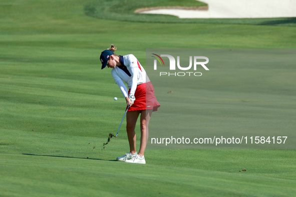 GAINESVILLE, VIRGINIA - SEPTEMBER 15: Sarah Schmelzel of the United States hits to the 18th green at the conclusion of the Solheim Cup at Ro...