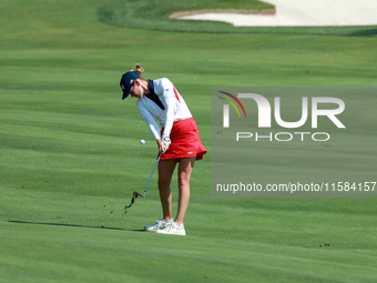 GAINESVILLE, VIRGINIA - SEPTEMBER 15: Sarah Schmelzel of the United States hits to the 18th green at the conclusion of the Solheim Cup at Ro...