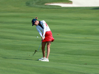 GAINESVILLE, VIRGINIA - SEPTEMBER 15: Sarah Schmelzel of the United States hits to the 18th green at the conclusion of the Solheim Cup at Ro...