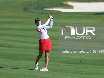 GAINESVILLE, VIRGINIA - SEPTEMBER 15: Sarah Schmelzel of the United States hits to the 18th green at the conclusion of the Solheim Cup at Ro...