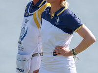 GAINESVILLE, VIRGINIA - SEPTEMBER 15: Madelene Sagstrom of Team Europe waits with her caddie on the 18th green during the final round of the...